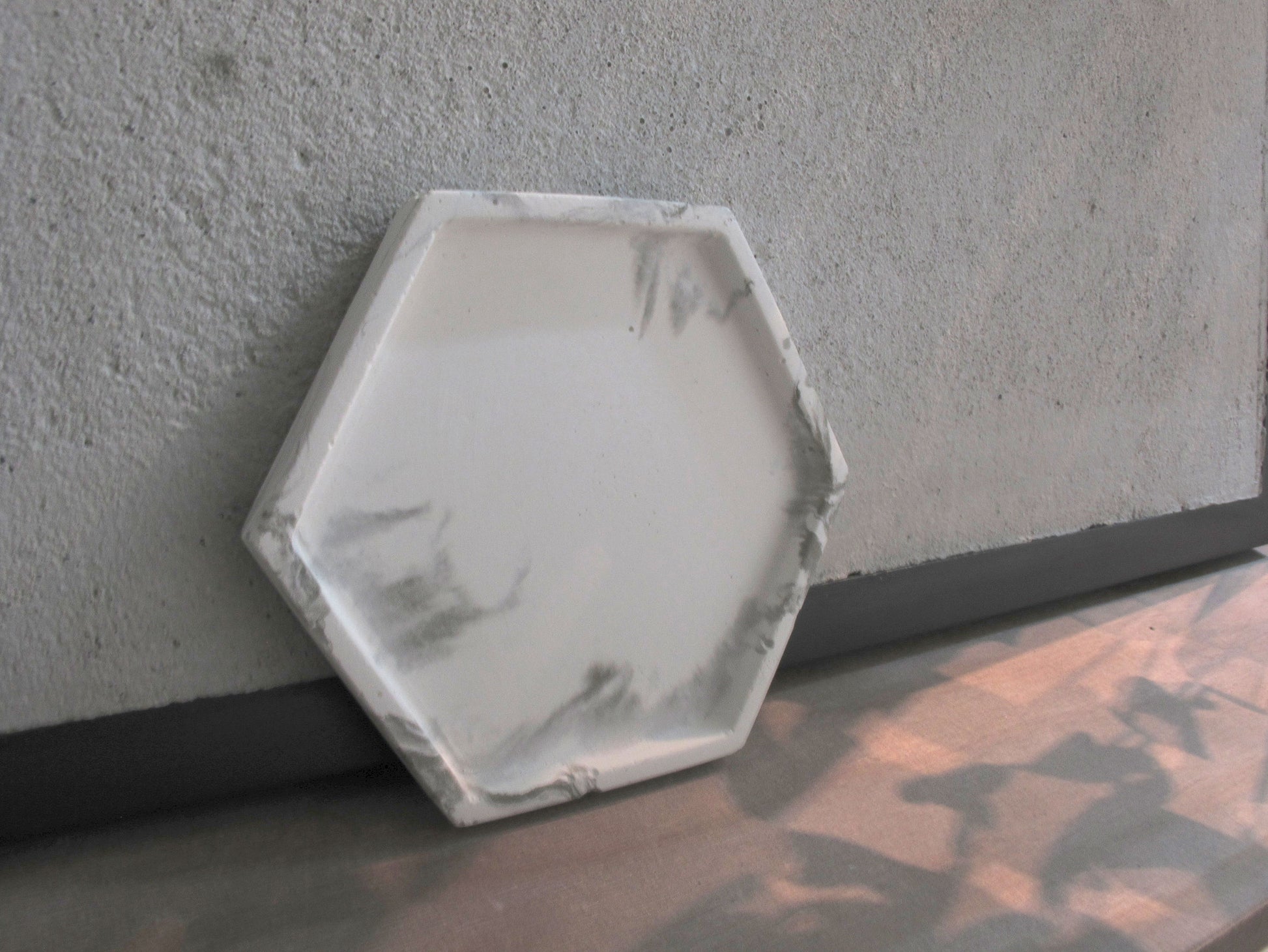 White marble patterned concrete tray / accessory holder in Hexagon shape